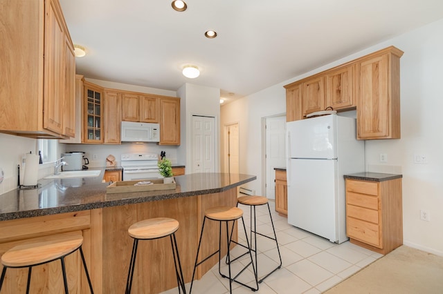 102 Phoxy Ln, Indian River, MI 49749 - kitchen featuring a sink, a peninsula, glass insert cabinets, white appliances, and recessed lighting