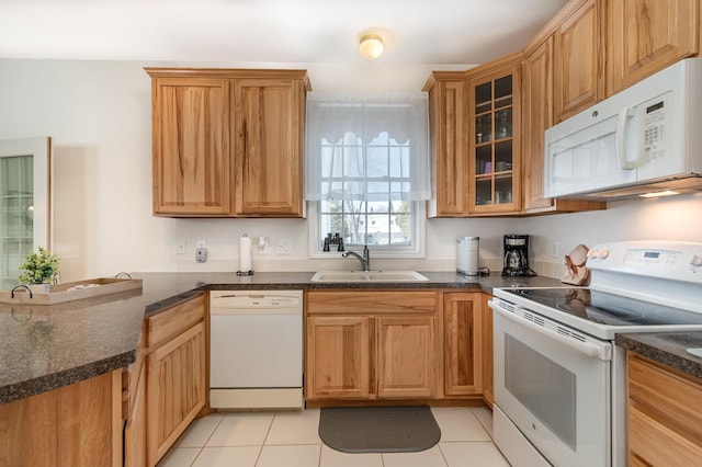 102 Phoxy Ln, Indian River, MI 49749 - kitchen featuring a peninsula, white appliances, glass insert cabinets, a sink, and light tile patterned floors