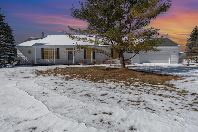 102 Phoxy Ln, Indian River, MI 49749 - view of front facade with a garage