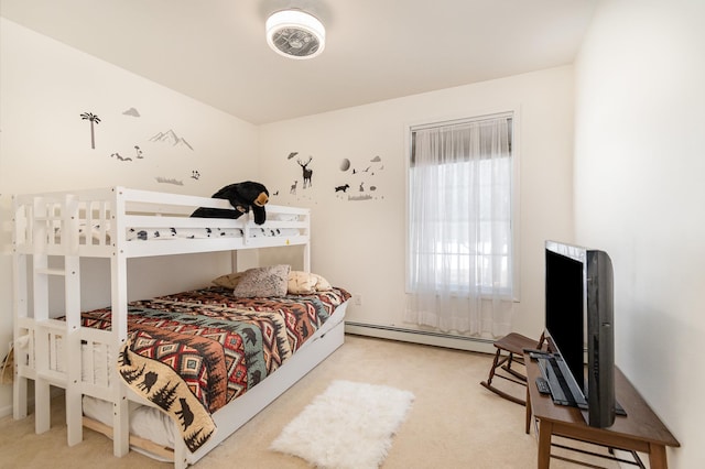 102 Phoxy Ln, Indian River, MI 49749 - carpeted bedroom featuring a baseboard heating unit