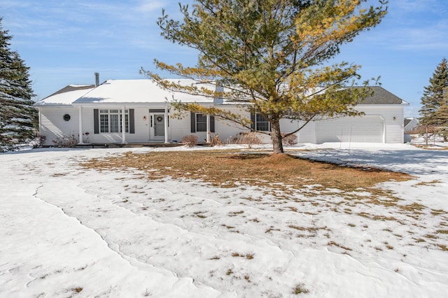 102 Phoxy Ln, Indian River, MI 49749 - view of front of home with a garage