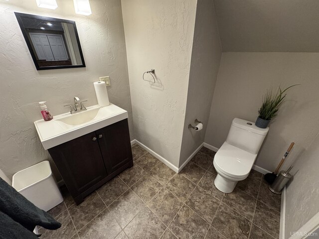 2111 Jordan Dr, Marinette C-Wi, WI 54143 - half bath with toilet, vanity, baseboards, and a textured wall