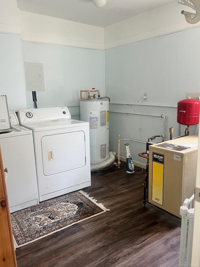 laundry room with water heater, dark wood finished floors, washer and clothes dryer, and electric panel