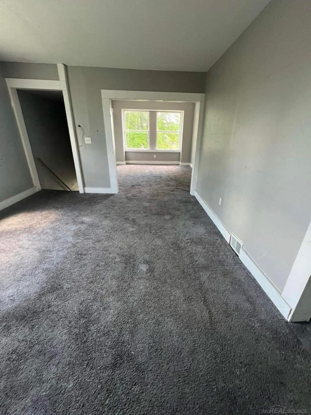 4716 Garland St, Detroit, MI 48214 - interior space with baseboards, visible vents, and carpet