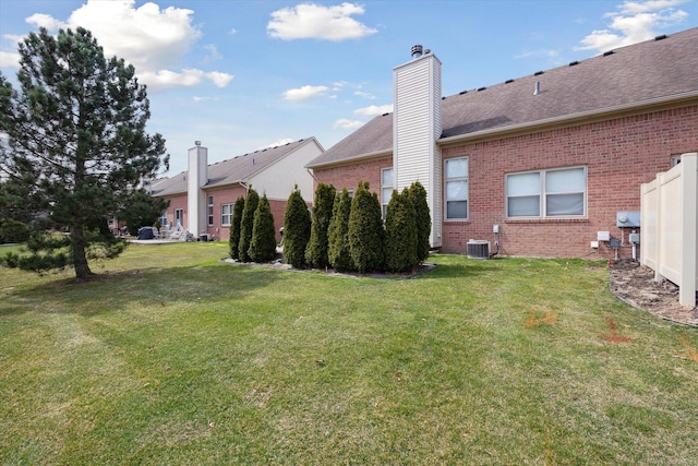 view of yard featuring central AC unit