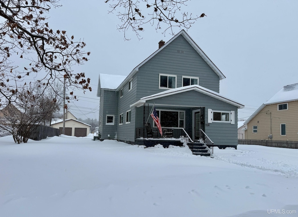 934 Oak St, Negaunee, MI 49866 - view of front of property featuring a chimney and covered porch