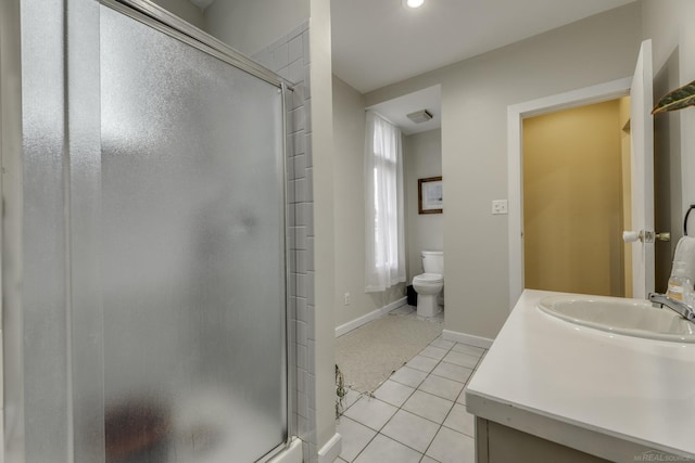 bathroom featuring toilet, baseboards, tile patterned floors, a stall shower, and visible vents
