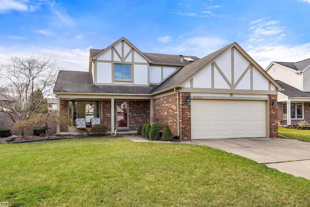 41640 Brandywine Dr, Clinton Township, MI 48038 - english style home featuring stucco siding, a garage, concrete driveway, and a front yard