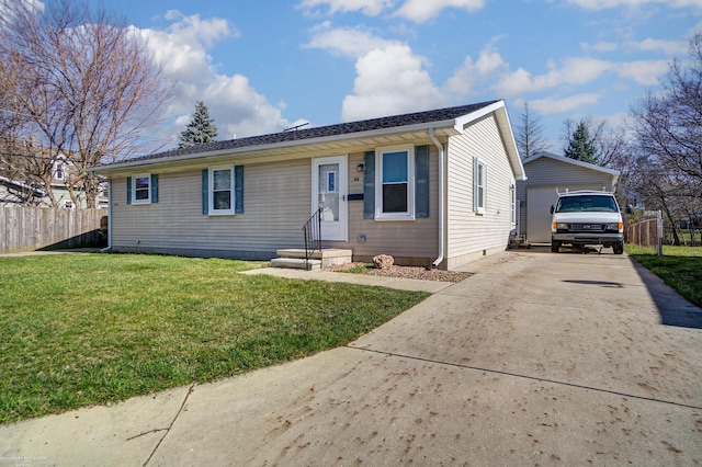 ranch-style house with a front lawn, driveway, an outdoor structure, and fence