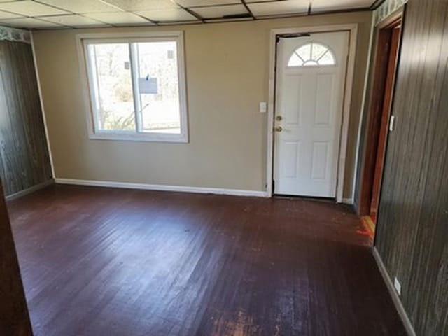 2488 Montana Ave, Saginaw, MI 48601 - entrance foyer with baseboards, wood finished floors, and a paneled ceiling