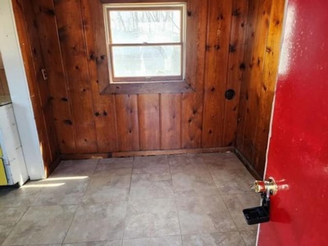 2488 Montana Ave, Saginaw, MI 48601 - empty room with wooden walls