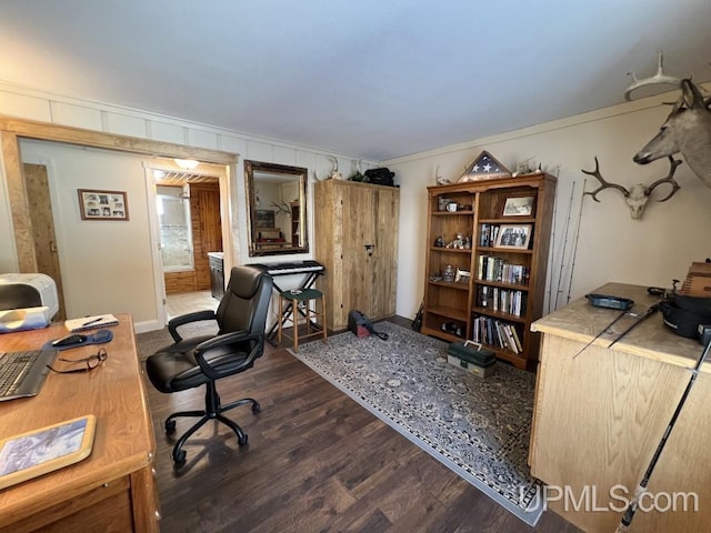 E3117 H44 Hwy, Trenary, MI 49891 - home office with ornamental molding, dark wood-style floors, and baseboards
