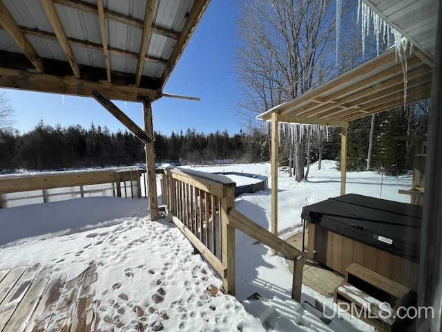 E3117 H44 Hwy, Trenary, MI 49891 - snow covered deck featuring a hot tub