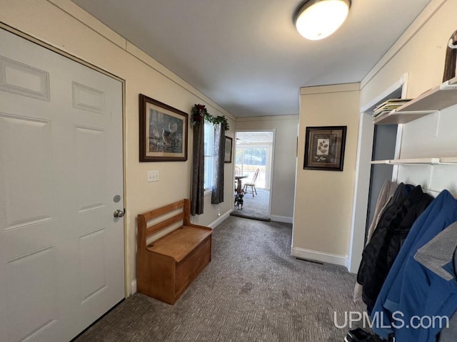 E3117 H44 Hwy, Trenary, MI 49891 - hall featuring dark colored carpet, ornamental molding, and baseboards