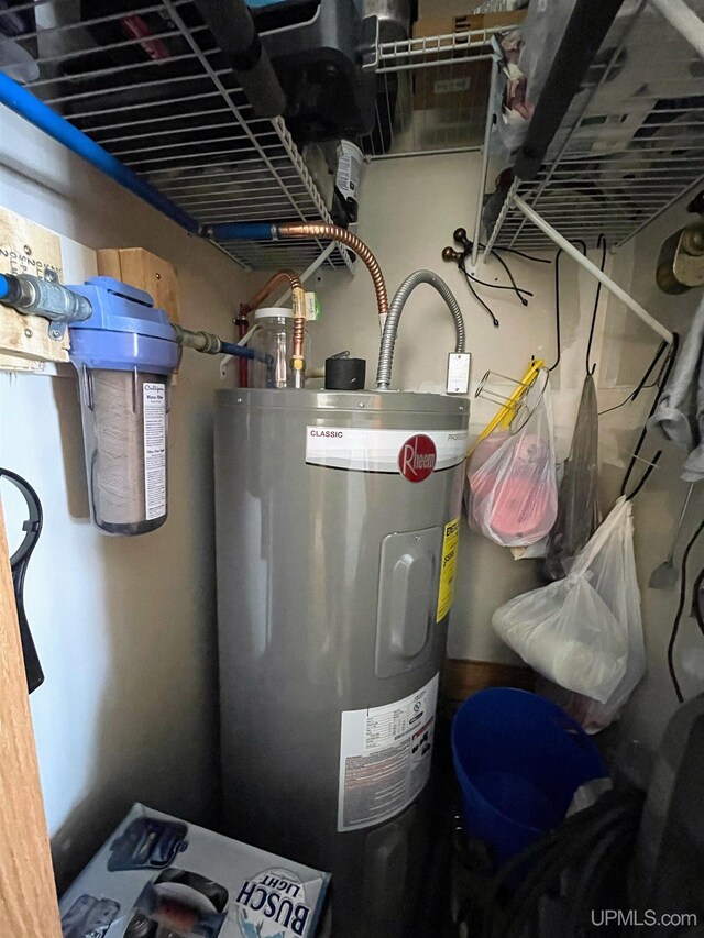 utility room with water heater
