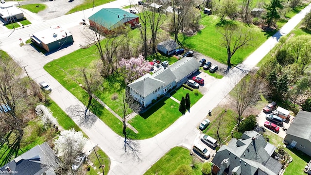 birds eye view of property with a residential view