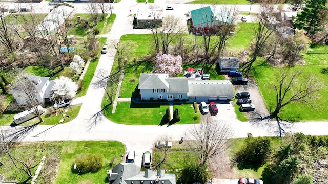 birds eye view of property with a residential view