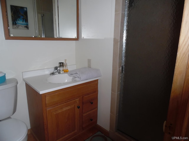 49436 S Superior Rd, Houghton, MI 49931 - full bathroom featuring vanity, toilet, and a shower stall