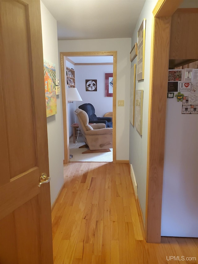 49436 S Superior Rd, Houghton, MI 49931 - corridor featuring light wood finished floors, baseboards, and visible vents