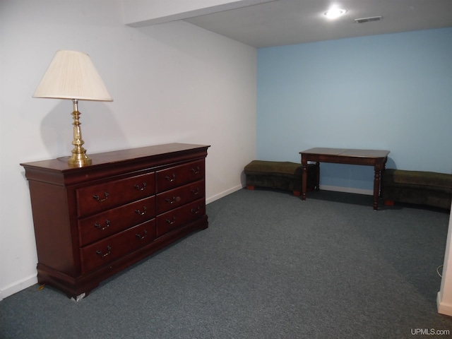 49436 S Superior Rd, Houghton, MI 49931 - bedroom with baseboards, visible vents, and dark carpet