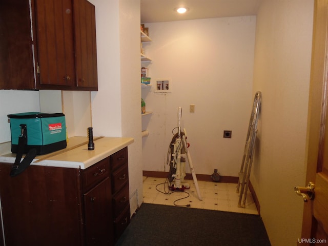 49436 S Superior Rd, Houghton, MI 49931 - clothes washing area with light floors, recessed lighting, electric dryer hookup, baseboards, and hookup for a washing machine