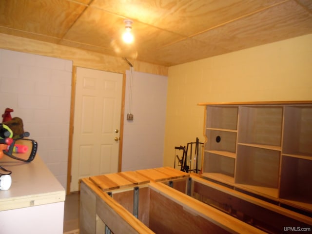 49436 S Superior Rd, Houghton, MI 49931 - interior space featuring concrete block wall
