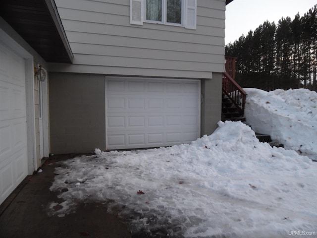 49436 S Superior Rd, Houghton, MI 49931 - view of snow covered garage