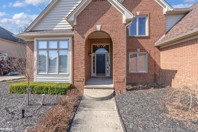 55763 Omni Dr, Shelby, MI 48315 - property entrance with brick siding