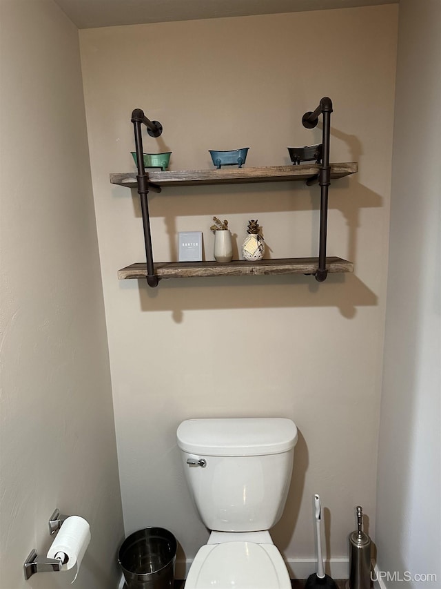 6234 State St, Garden, MI 49835 - bathroom featuring toilet and baseboards