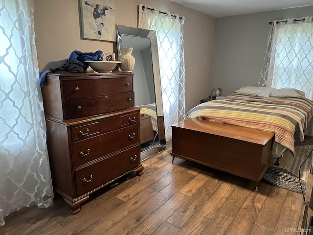 6234 State St, Garden, MI 49835 - bedroom featuring dark wood-style flooring