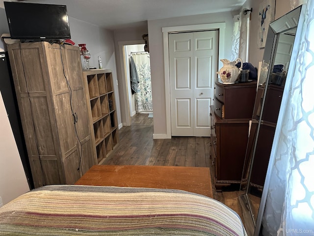 6234 State St, Garden, MI 49835 - bedroom featuring dark wood finished floors and baseboards