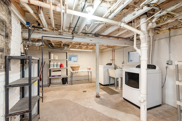unfinished basement with washing machine and dryer