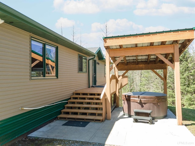 126 Big Bear Rd, Iron River, MI 49935 - view of patio with a hot tub
