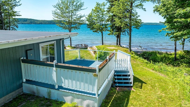 property view of water featuring stairway