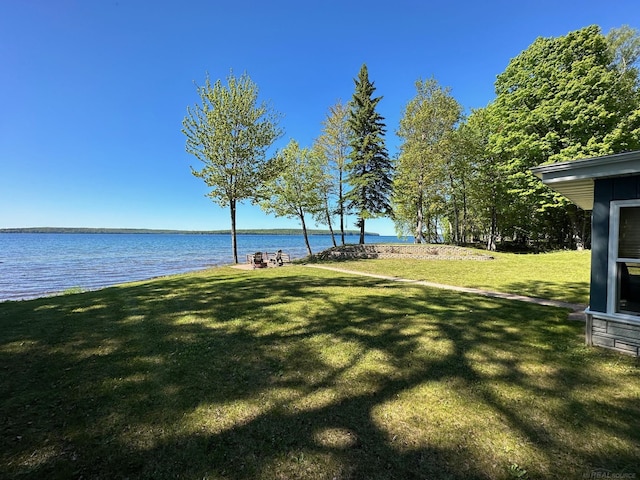 view of yard with a water view