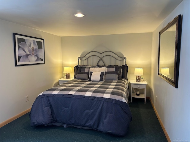 bedroom featuring baseboards and carpet floors