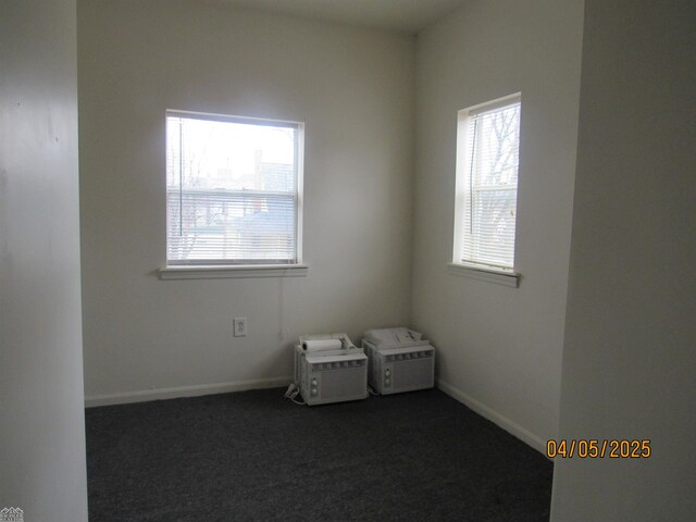 505 Washington St, Marine City, MI 48039 - unfurnished room featuring baseboards and dark carpet