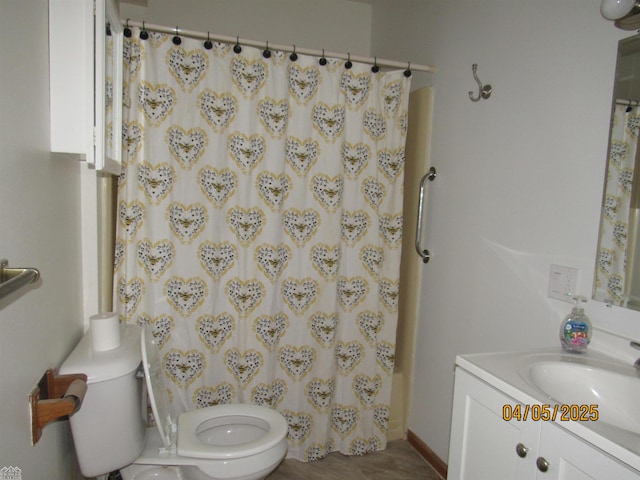 505 Washington St, Marine City, MI 48039 - bathroom with a shower with shower curtain, vanity, and toilet