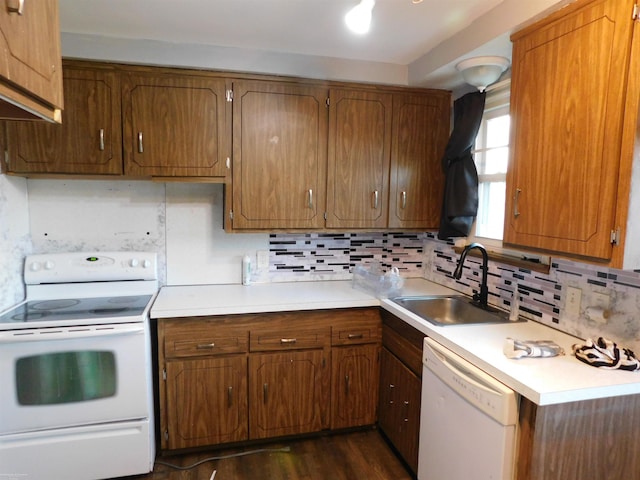 27324 Larchmont St, Saint Clair Shores, MI 48081 - kitchen featuring a sink, backsplash, light countertops, and white appliances