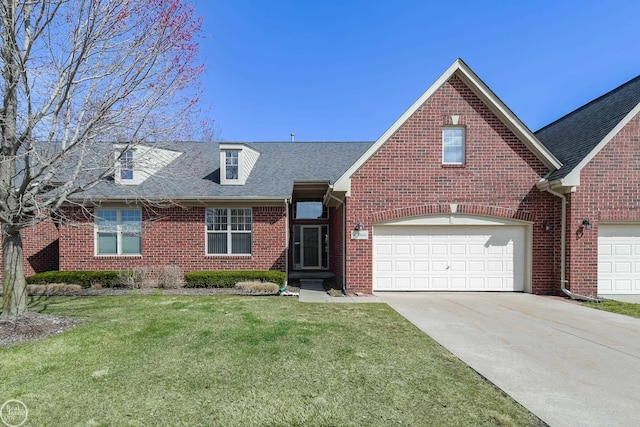 view of front facade featuring concrete driveway, brick siding, a garage, and a front lawn