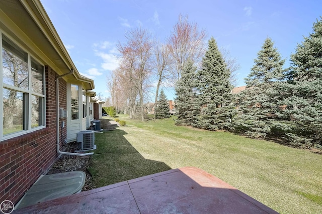view of yard with a patio and cooling unit