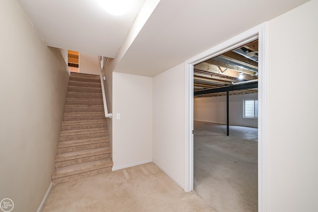 stairs with carpet and baseboards