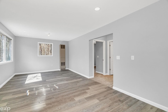 2407 Karen St, Prescott, MI 48756 - empty room featuring wood finished floors and baseboards