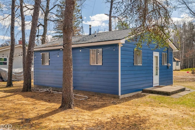 2407 Karen St, Prescott, MI 48756 - exterior space featuring roof with shingles