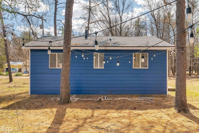 2407 Karen St, Prescott, MI 48756 - exterior space with a shingled roof