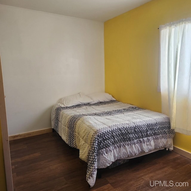 N5352 Pine St, Shingleton, MI 49884 - bedroom with wood finished floors and baseboards