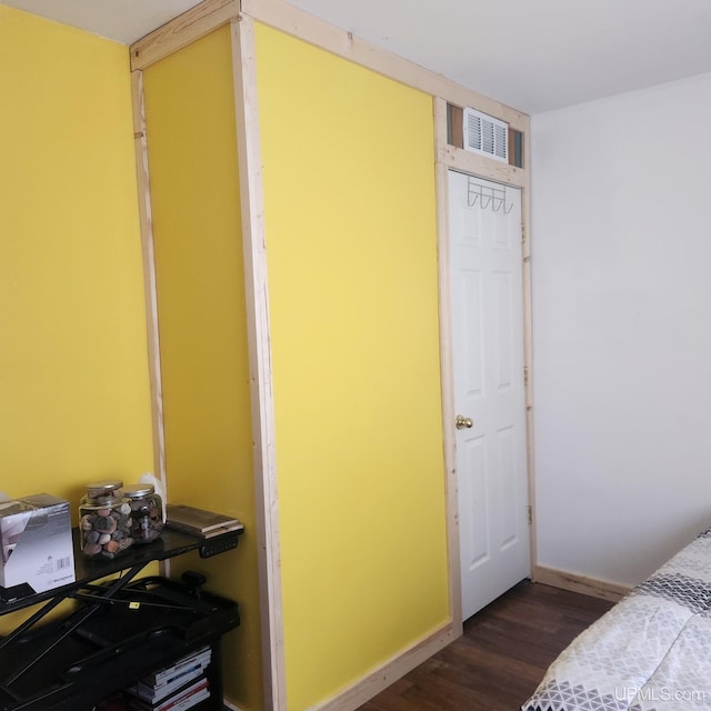 N5352 Pine St, Shingleton, MI 49884 - bedroom with dark wood-type flooring, visible vents, and baseboards
