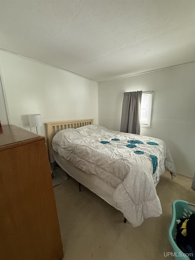 N5352 Pine St, Shingleton, MI 49884 - bedroom featuring carpet and a textured ceiling