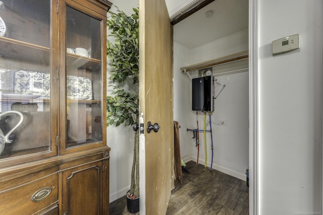 7173 Lake St, Lexington, MI 48450 - doorway to outside with dark wood-style flooring and baseboards