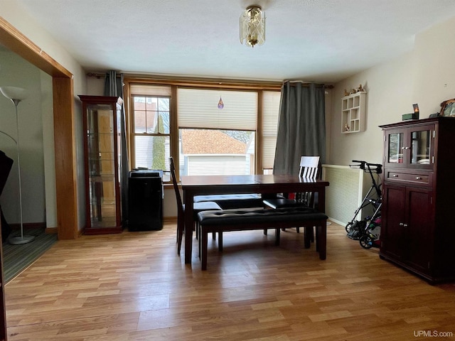 1215 Dakota Ave, Gladstone, MI 49837 - dining space featuring light wood-type flooring